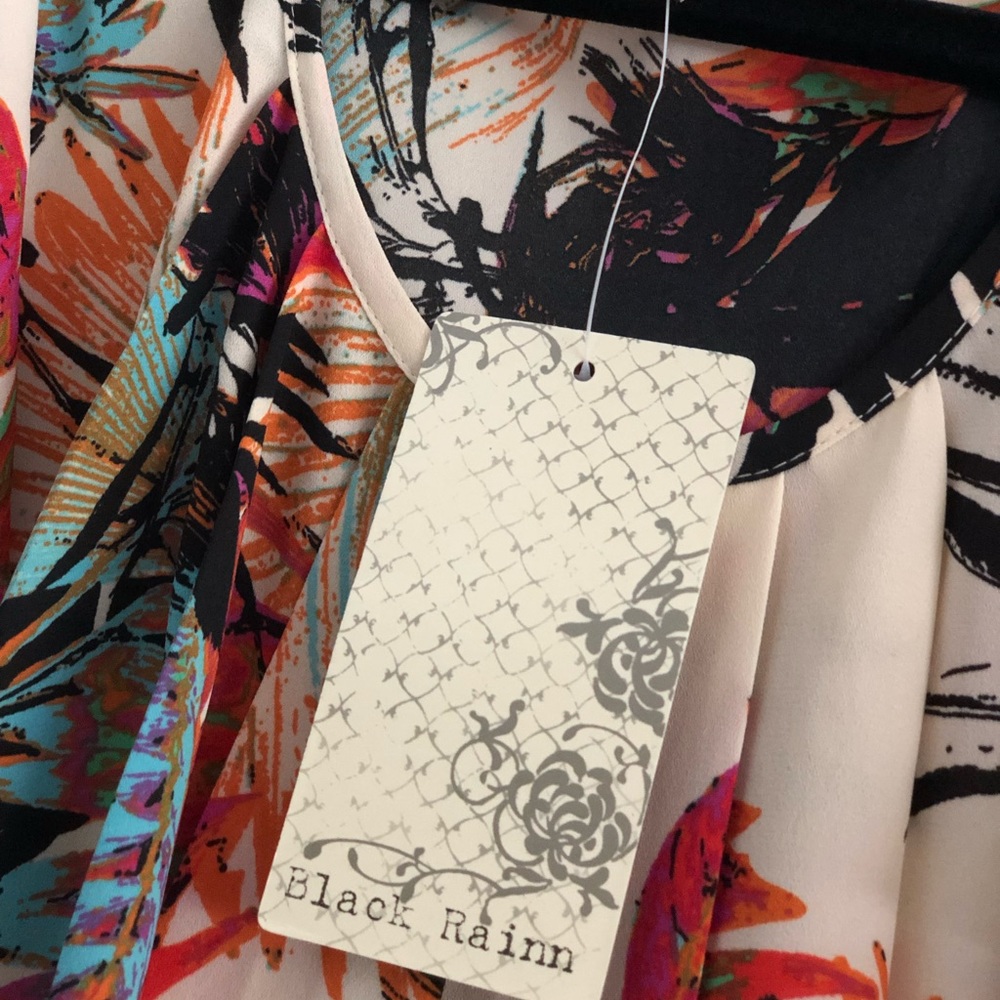 NWT- short sleeve top  w/ruffled flare!